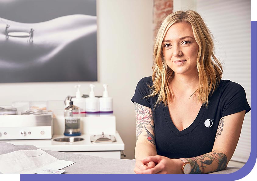 woman smiling at counter
