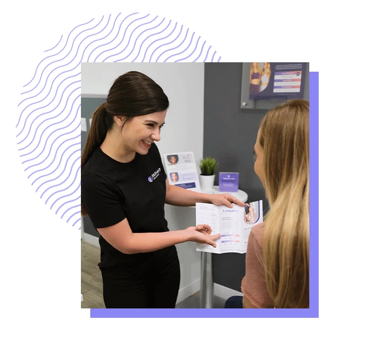 Woman showing customer waxing options